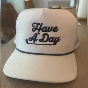 White Trucker Hat with Navy Embroidery